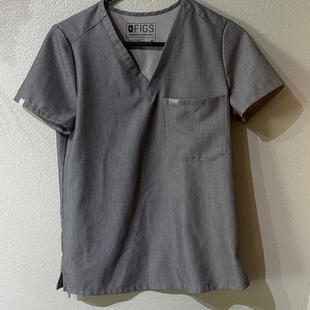 FIGS Women’s v-neck scrub top. Size XS. Color Graphite. In excellent condition.